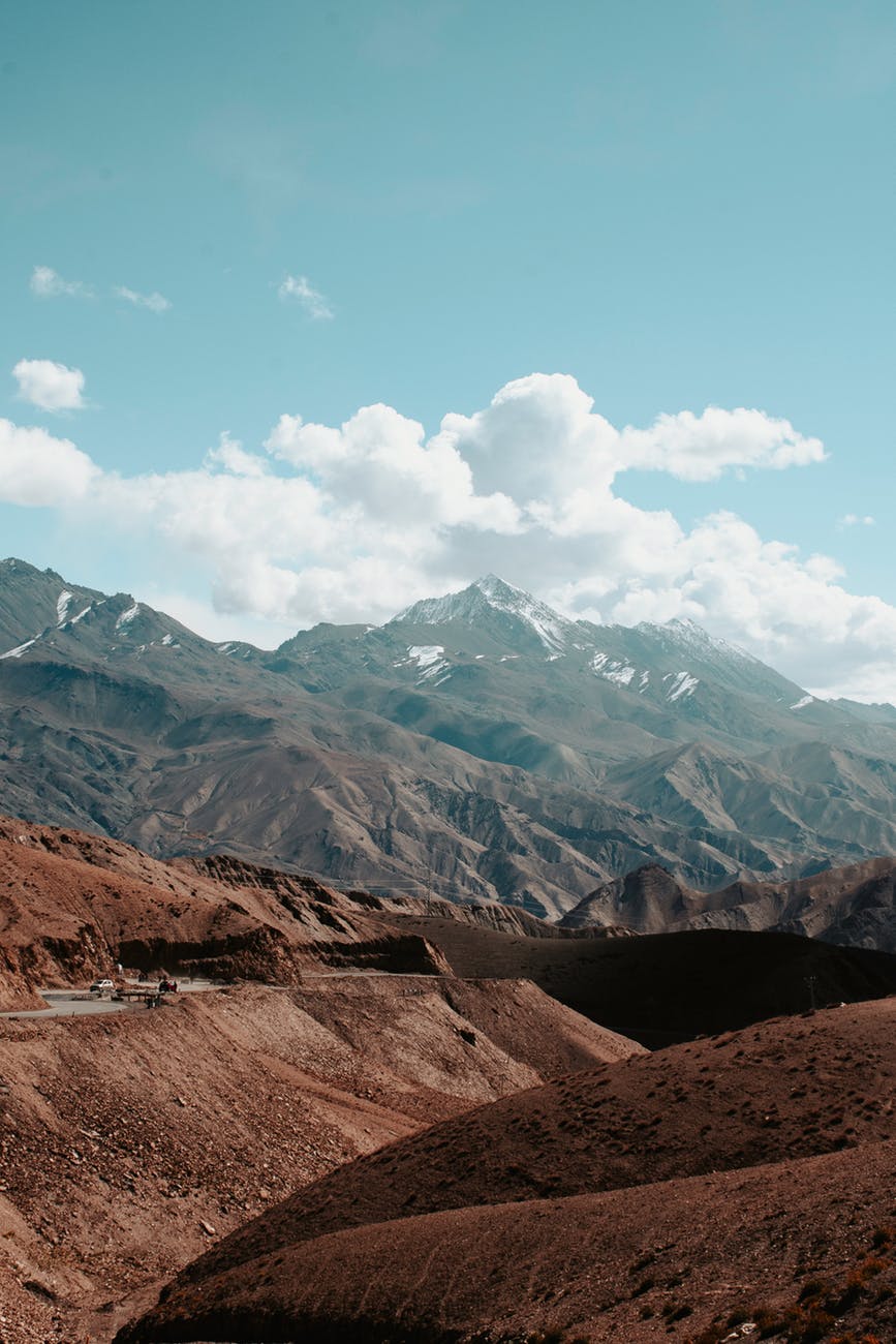 mountain ranges under clouds