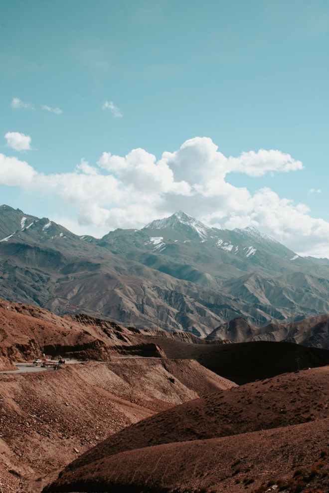 mountain ranges under clouds